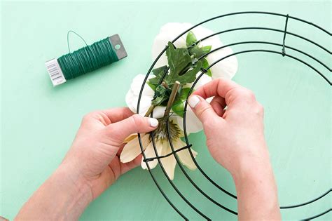 how to attach flowers to metal wreath